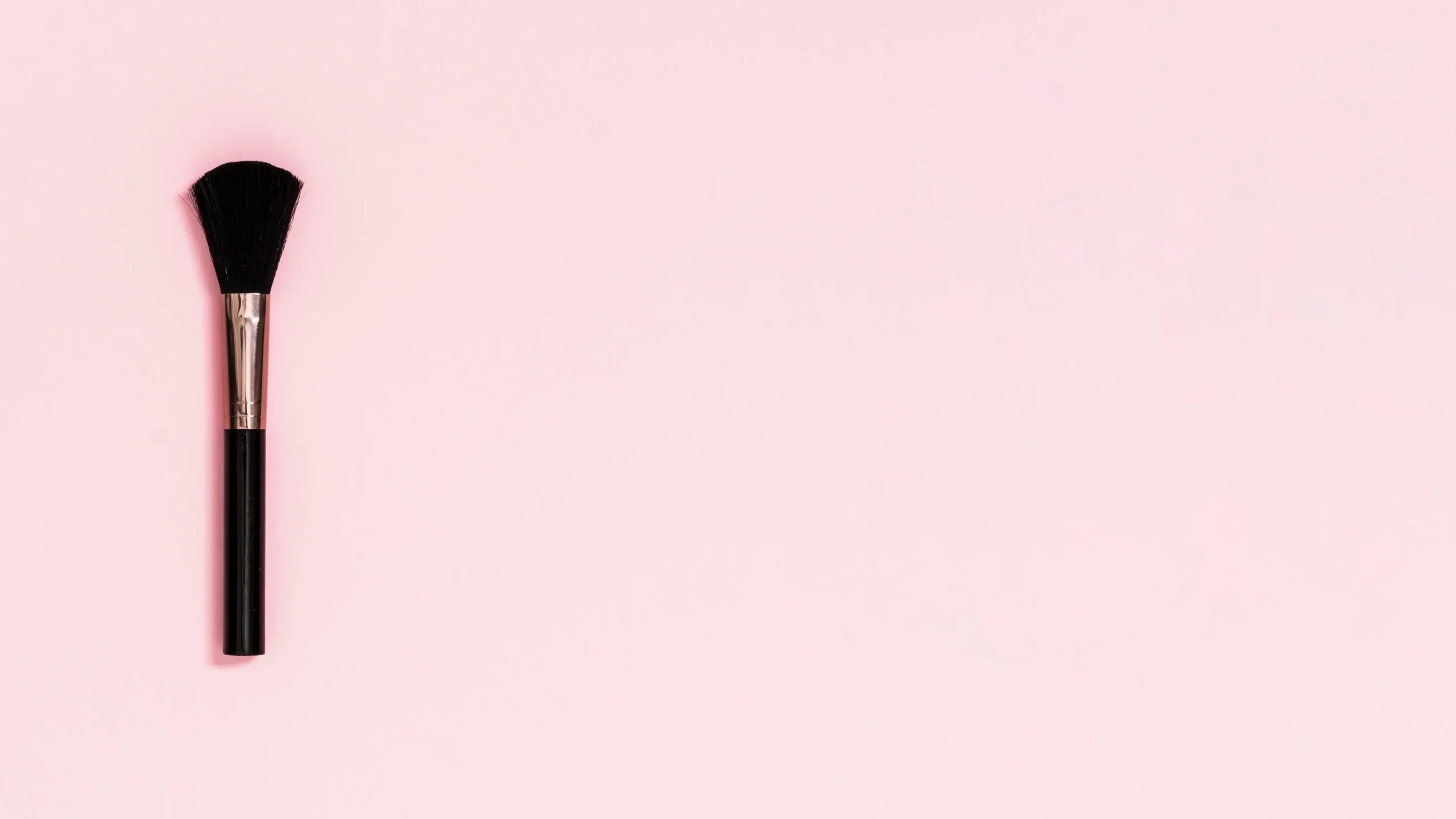 black-makeup-brush-pink-background (1)